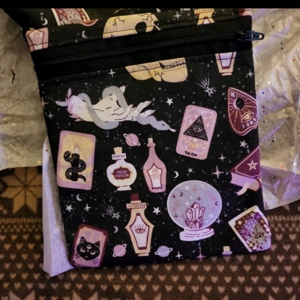 Spooky skulls, spells, magic zip pouch - approx 7x6